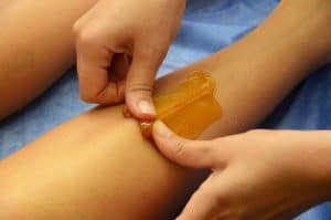 Leg waxing-sugaring