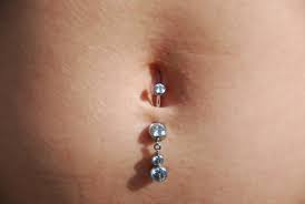 Bottom navel piercing