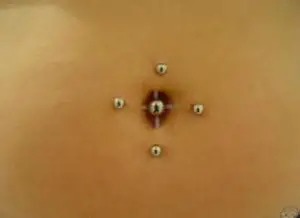 Multiple double navel piercing
