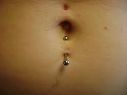Top and Bottom navel piercing