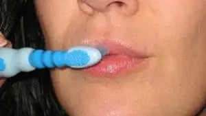Exfoliate Lips with Toothbrush